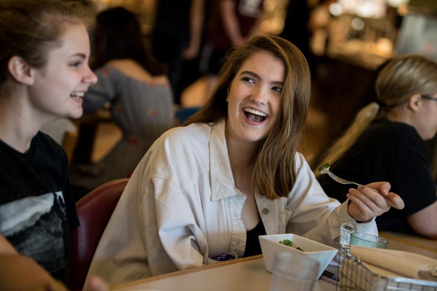 Meal times on campus are a great time for students to meet up and enjoy each other's company.